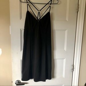 Black dress with crossing straps in the front